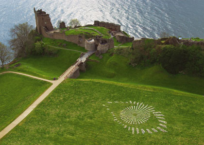 The Big Brother stone sculpture, constructed at Urquhart Castle, Loch Ness, Inverness, Scotland, with permission by Historic Scotland, took a crew of ten people about ten hours to complete. Approximately fifteen tons of limestone from a local quarry were delivered to the site, and the eye was visible for forty-eight hours before it was removed by the crew.